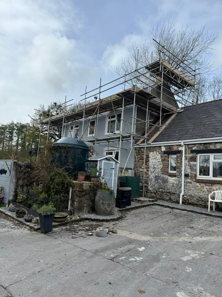 Chimney scaffolding on a stone cottage