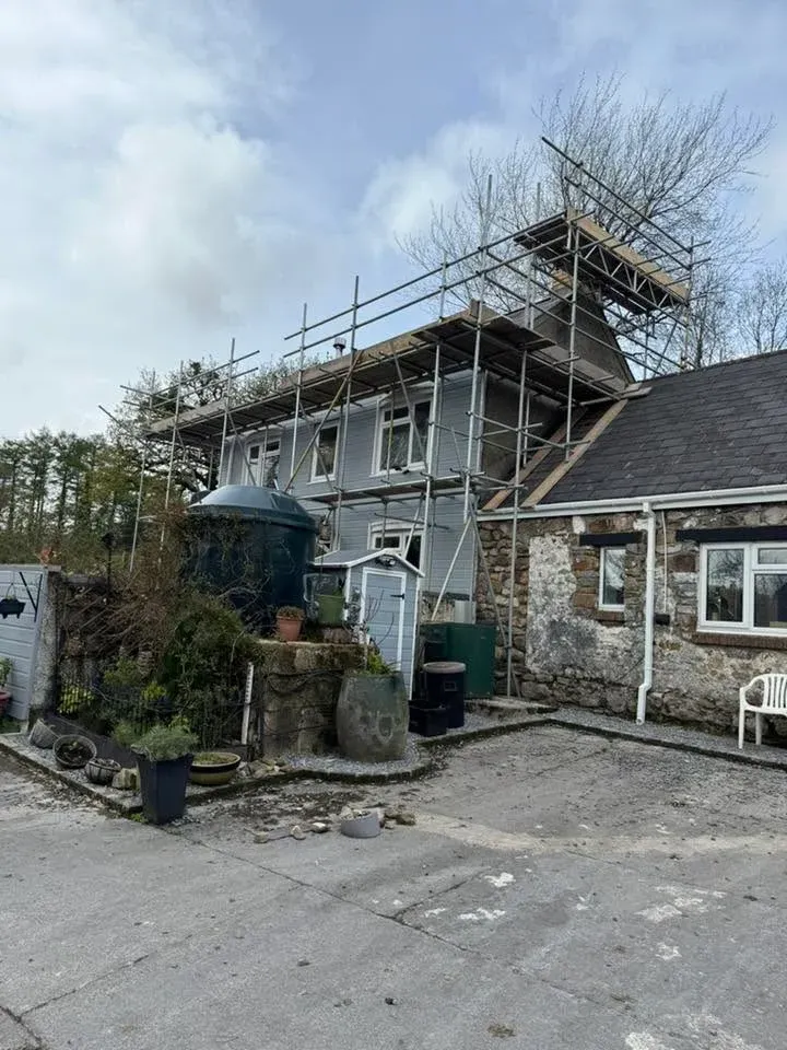 Chimney scaffolding on a stone cottage near Swansea
