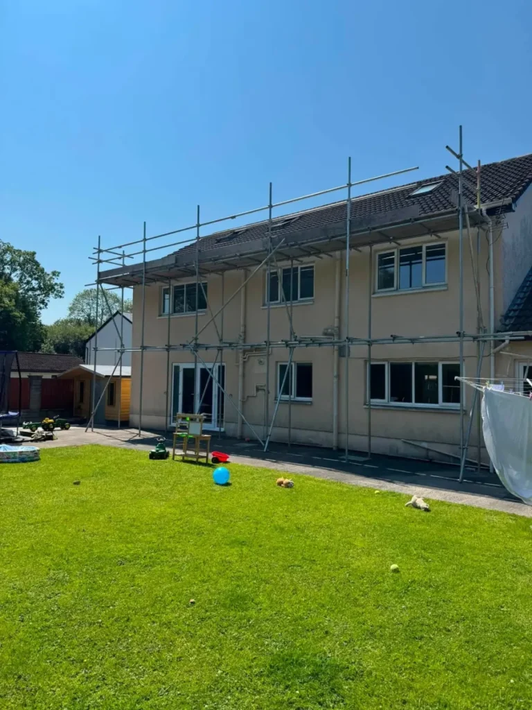 Domestic scaffolding on the rear elevation of a house in Swansea