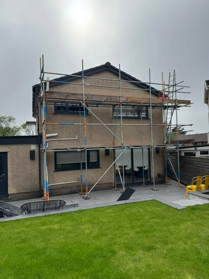 Two-storey scaffold at the rear of a house ready for roof works